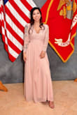 I bought this dress dress for a Marine ball and I got many compliments on it!
It was a little tight on my arms, but a bigger size would have been be too big.
I got the length adjusted as it was too long for me. - Camila M.