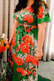 I wore this dress for a wedding in Miami. It is bright and vibrant; the colors are very beautiful. I am rather tall and I wore this dress with a 2 inch heel and it was the perfect length with no alterations. I have a rather ample bust and would have appreciated a hook and eye or snap modesty closure, as some of Lulus other maxi dresses have. I had to secure it with two safety pins, or else my cleavage would have looked obscene. This dress is not lined, however it is not see-through. The sleeves are not as long in real life as they are in the photo of the model. I suspect she may be wearing the dress in a size larger tha  her actual size. For me, the dress was not as drapey and the sleeves fell to my mid-upper arm. It was a comfortable dress, though, and as I mentioned above, the colors were very bright and eye-catching. . - Justina U.
