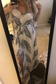 I didn't want it to look too loose because I still wanted to look like I had a shape and not wearing a potato sack. I typically wear a medium but the small fits way better, it's shorter so I don't need it tailored, still loose but has a little more shape to it so it's more flattering and not baggy. I love it! - Sarah T.