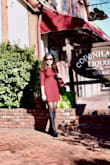 It fits comfortably. A little bit short but I pair it with tight and high knee boots. The combination is just perfect. I got a lot of compliments. :) - Alena D.