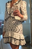 I was looking for a dress that checked off all of the above, Classy (black and white lace) Sexy (short with a v neck) Fun (the ruffles make this dress so fun). The fit was true to size. It wasn't clingy but fitted. I love this brand and it's my 2nd dress from this brand purchased from Lulus. Love it!! - Jessica L.