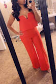 I was in between getting a medium or a large because the measurements for a large seemed so big, but the large was a perfect fit. I'm not blessed in the chest department, but it made it look like I was and the lining up top made sure it stayed put all night. I had to have it hemmed a bit for my height but overall my favorite romper! - Lani D.