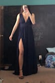 I ordered the dress in denim blue and this navy in the same size (small) and the navy seems to have a slight loose fit on the chest but otherwise it fits perfectly. - Annabell B.