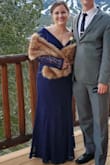 I ordered a large, knowing I would need alterations on the length for sure, but I wanted to make sure it wasn't too tight. In addition to taking off some of the length, I altered the shoulder area as well.

I was very impressed with the outcome and the quality of the dress! - Kimberly K.