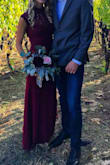 Wearing as a bridesmaid dress. The length is barely long enough for me, I will be wearing flats. It fits beautifully. - Sarah N.