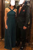 I got tons of compliments on this dress. It was very flattering and the dark green color is gorgeous. It was tight on my rib cage, which made it uncomfortable when sitting at dinner. It would be way too long on a shorter person. I'm 5'7" and wore two inch heels and was just able to squeak by without having it altered. - Bonnie N.