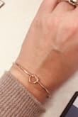 I am SO happy I bought this bracelet! It is super cute, delicate looking but great quality. I have been wearing it almost everyday for the past two weeks! Love the rose gold color. I am getting married this year so the "tying the knot" design is just perfect! - Nicole S.