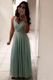 The dress has such a nice, fancy look to it. It feels and looks amazing!
Wore it to a friend's wedding and received so many compliments.
Definitely recommend it. I just had to get it trimmed and closed the cleavage area a bit. - Fernanda