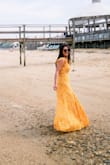 I get compliments on this dress every time I wear it! It's a great flowy summer dress, with a slit on one side and an open back. I've found so many reasons to wear it - on vacation, summer date nights, events, etc. You won't regret purchasing! - Marianne B.