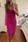 The top of the dress and hip area fit, but the stomach and leg area were too large and bunchy. Unfortunately, because it was a clearance item, I'm unable to exchange it for an XS. :( The magenta color is really pretty! - Joanna R.