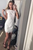 I bought a small and the back stuck off. I had to end up getting it tailored. I still highly recommend it because it was beautiful and didn't look cheap. The rest of the fit was great. - Jen B.