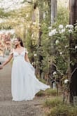 We were having a planned elopement, and I wanted a dress that wasn't over the top expensive but looked pretty. This dress was a perfect. The quality is amazing, it was actually long enough on me, which is rare at my height.  Picture perfect. I couldn't be happier with this purchase. - Alyssa D.