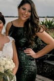 I received lots of compliments in this dress. It was nice and elegant. I wore it for my brothers wedding. It was not overly bright or sparkly. - Adilene A.