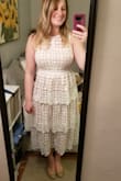 I cant wait to wear this for my rehearsal and rehearsal dinner! This dress is unique and beautiful. The fabric is very nice quality. It is a bit tight and kind of flattens the chest area (even with a padded strapless bra added), but I am happy with my size and am excited to wear it. - Erica D.