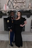 I'm definitely an hourglass shape and in between a size 12 and 14. I got an XL and there was plenty of room. It was slightly big on top but if I had worn a bra I'm sure it would have taken up that extra space. I wore it to a military ball and it was beyond comfortable with the stretch that this fabric has and elegant enough to wear in formal settings. The material steamed out nicely and the netting that allows the collar to keep shape was malleable with heat as well after shipping. Everyone should have this dress! The length was perfect with heels and not heavy holding it up in the snow. - Mikel G.