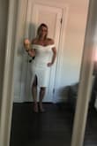 Looks expensive, stretchy material, I'm between XS and small, but XS fits perfectly. Can't wait to wear it out somewhere. - Eszter P.