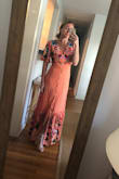 Guessing my size in dresses is hard for me because I have a huge ribcage and can usually only wear small dresses if they have some stretch. If they don't (like most formal dresses), I need a medium. I originally ordered a medium because it fit okay but was shapeless. I returned it for the small and it fits perfectly, even with my wide torso and wide waist. Now that I'm in a small, it's super flattering and feels well made. I LOVE it and can't wait to wear it. I know I'll get a lot of compliments with this piece. - Molly S.