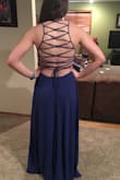 This dress is amazing! I think I could order a medium and have it fit better than a large. I am excited to show this dress of at prom! - Sarah C.