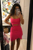 This dress is so cute and fits so nicely. The material is stretchy, but also hugs all your curves. I'm able to wear it without a bra (which is always amazing) and it still makes me look curvy. I'm literally considering buying this dress in other colors cause it's that good. - Gigi N.
