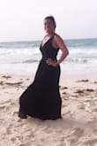 I bought this dress to wear for my friends destination wedding in DR. It was a little warm for it but I didn't care because it fit amazingly and was stunning. Can't wait to wear it again. If you are on the short side it will definitely need to be hemmed. No bra was needed as the dress stays nice and tight to the chest. I am a 34D or 36C. - Camille M.