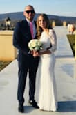 This Beautiful dress fits perfectly, shows the curves and the length was perfect with the hills. It touches the ground just a bit with hills but gives the touch to it. I used this for my civil wedding, everyone loved it and my husband couldn't resist. I totally recommend it. - Carla A.