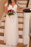 This was a perfect impromptu wedding dress! It fit a bit big in the chest and arms but nothing that couldn't be solved with some double sided tape. I did hem the bottom a couple inches because it was way too long. Everyone was stunned by the dress and I go so many compliments! - Jesse F.