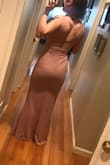 I usually get mediums in their dresses, so I stuck with it and it was almost perfect. It fits a little tightly around my thighs and booty with a little bit of extra room in my waist, but I love it so much. Wearing it as a bridesmaid dress in May. :) It has a lot more coverage over the chest than it does on the model, for me at least. I'm 5' 7.5" and the dress touches the floor, so heels will be needed! - Hannah K.