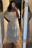 Heavy dress. Not see through at all. Love how it sinches in at the waist does not have the baggy effect. Longer then expected, but doesn't take away from how beautiful this dress looks. Quality is impeccable. This is going to be perfect for an all white party I am going to. This is the first dress I ordered with Lulus and I will definitely be placing another order soon. Fast shipping and great quality. - Gladys M.