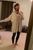 Very soft material, but it's hilariously large. I'd love to reorder a size smaller, but even that wouldn't fit. Between the length and the extra material on the side, you could probably make two sweaters! - Jordan K.