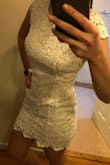 This has a nice thick lace quality and it's just long enough to cover my booty with my long legs! The opening in the back is very cute. I will wear stickies as a bra and wear it for my bachelorette party! :) I ordered a Medium and I like how it fits. - Anna T.
