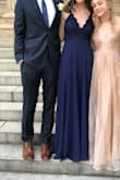 This dress was perfect for my winter formal. It was simple, yet elegant and I felt completely comfortable in the dress all night! The navy blue color was darker in person but I personally thought the image looks like a blue/grey color anyway. The length of the dress was still a little long on me. To make it perfect without getting it hemmed, I would recommend wearing it with at least three inch heels. I also rush shipped the dress and it was a tad bit wrinkled, but I pressed it with an iron and hung it up so it's all good. Overall I really liked the dress and I am planning on wearing it again! - Macy L.