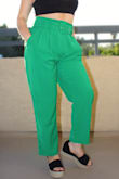 Okay, they fit nothing like the model, but that's because I'm really short!! The color is very vibrant, perfect for spring. They fit a little loose at the waist, but the belt helps keeping them up. - Vanessa S.