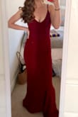 Absolutely LOVE this dress! It fit me perfectly and hugged me in all the right places. The material was thick, stretchy, and good quality. The burgundy color was beautiful, as well. I'm on the shorter side so it was a little long, even with heels. - Sinead O.