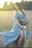 I ordered this dress for my anniversary photo shoot and it was perfect! I received so many compliments, and the color is beautiful! - Kacee B.