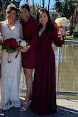 It's a very beautiful dress. I wore it as a bridesmaid. It's simple and easy to walk in. I just had to hem it since I'm only 5'1. It's very difficult to show the slit, though, because it has so much fabric and the neckline can be very exposed sometimes even if you tie it the way you want. - Sreyleak N.