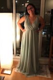 Absolutely beautiful dress! Really glad I read the reviews because normally I'm a medium but a small fit me perfectly. So if you're planning on getting this dress, order a size down from your normal size!! Some side notes... I will have to get it hemmed as it's super long - even with 4 inch heels, it's still too long for little ol' me. The shoulder are also a bit loose so I will have to get those adjusted as well. The waist itself a snug fit, but stretches a that's okay. Overall a lovely dress! 100% recommend. - Paula M.