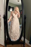 For being 5'2", the dress is a little long, but that's an easy fix! It fits perfect everywhere else and I'm so excited to wear it to my prom this year! - Sarah G.