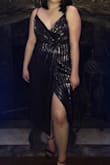 I ordered this dress and wore it for my college's winter formal. It was a perfect fit and a nice balance between formal & semi-formal; which was exactly what I wanted for the occasion. Depending on your chest size, you could possibly go braless in this super flattering dress. I almost did but decided on a strapless bra last minute, either works! Material is light enough that it is comfortable but not so thin that it's see-through. & the metallic look is bound to stand out! Adjustable straps were also a plus. Strongly recommend this dress! - Anita L.