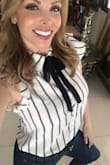 I don't like fabric but is OK for price....... but I like it for casual days. - Blanca C.