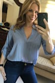 I really love this blouse. Nice fabric, very comfortable. Fit loose and nice cleavage. - Blanca C.