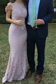 This dress fit me perfectly I just had to get the bottom hemmed a little. The color is perfect, and the lace is so pretty! I wish I could wear this dress to every wedding, I got a ton of compliments. - Stacy F.