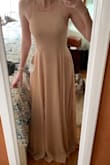 I'm a bridesmaid in a friends wedding. The bride wanted the bridesmaids in different shades of blush/pale pinks. At first I thought the photo looked a little on the peach side but I saw some customer review pictures and decided to give it a go. The color is perfect! I love the detail of the back of the dress. And for the price, I couldn't say no. The best part was the free shipping! I live on one of the Hawaiian islands and was worried about how long it would take to arrive. It was here within 5 days!  It is on the longer side. Usually I worry about dresses being too short when I order them online. I'm wearing 3 inch heels in the picture. - Melanie K.