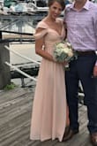 This dress is so cute. Had to order it as a bridesmaid dress for a friends wedding. Very flattering and comfortable. Dress cuts pretty low in the front. Built in cups so you don't need to wear a bra. - Shana E.