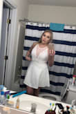 The fabric of this was nice and stretchy. It felt comfortable and has a slip underneath the skirt which was nice. The neckline was a bit lower than the pictures with the models showed and that was really my only problem with it. - Sarah B.