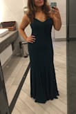 I can't say enough good things about this dress! I wore it to a wedding and as other ladies have stated, the compliments were endless! This dress fit me like a glove and hit all my curves beautifully. I did wear a pair of Spanx so I was completely smooth and comfortable, but I probably could have gone without. The length was perfect for my 5'4 frame, I did not have to have it hemmed or wear sky high heels. The green color was gorgeous and I felt so beautiful. So beautiful that I bought the navy and burgundy to have on hand for whatever fancy occasions that might come up in the future! - Tess F.