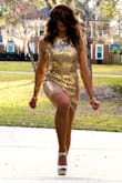 I adore this dress. It's classy, sexy and very eye-catching. It sparkles like a golden diamond. It's very well made, but as typical with sequined dresses, there are a few loose threads along the zipper. I just pinned them down with dabs of superglue. Invisible and works fine. You certainly don't want to catch them in the zipper. Bottom line: I love it! - Julie D.