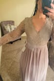 I loved this dress! The zipper fit me like a glove. It's a little long so you'd want to wear heels! The V is still modest but sexy and the open back is nice. The only thing I didn't love was that the sleeves are a little loose, the lace isn't really fitted to your arm. Otherwise, it's great purchase! - Amanda F.