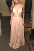 I ordered this dress in a size 8- I'm 5'10, around 155 pounds, and I am usually between a 6/8 in dresses. It fit really well in all areas for the most part. Given my height, this dress still dragged on the floor. This gave me the opportunity to wear heels! The dress is very light and flowy, but unfortunately the dress is not breathable at all, and I was afraid I would be too hot wearing it as a bridesmaid in a June wedding. Also, the straps/clasp at the neck really dug into my neck, and it was really uncomfortable. Lastly, one side of the dress in the chest area slightly gaped open. It wouldn't lie flat against my chest, so it was going to need serious fashion tape but the other side was fine. The chest is padded, but I still did not feel confident about the dress holding me in. I'm pretty small chested. The color of this dress is a true blush/light pink, and the rhinestone belt is a nice touch. Unfortunately, this just didn't work out as a bridesmaids dress for me. I was sad to return it, but I ended up ordering another dress from Lulus. - Alexandra F.