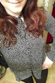 I like this blouse a lot. It's super cute. The material is lightweight and flows nicely. It's a bit sheer in places, but nothing a camisole underneath won't fix. My only dislike regarding this top is that I wish the backing material behind the buttons was a little wider, as sometimes when I move it gapes between the buttons and shows some chest. Since I'll be wearing a camisole underneath anyways it isn't a deal breaker, just something odd that I noticed. All in all it's a great work blouse! Pairs great with the Kick It Trouser Pants and Miss Independent Blazer (both also sold by Lulus.) - Rebecca W.