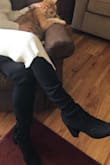 These boots are really comfortable and they stay up around the knee with a slight amount of slouch throughout. I can only wear them with leggings and not over jeans, but that's not a dealbreaker for me since you can pair them with any dresses or shorts. - Lisa S.